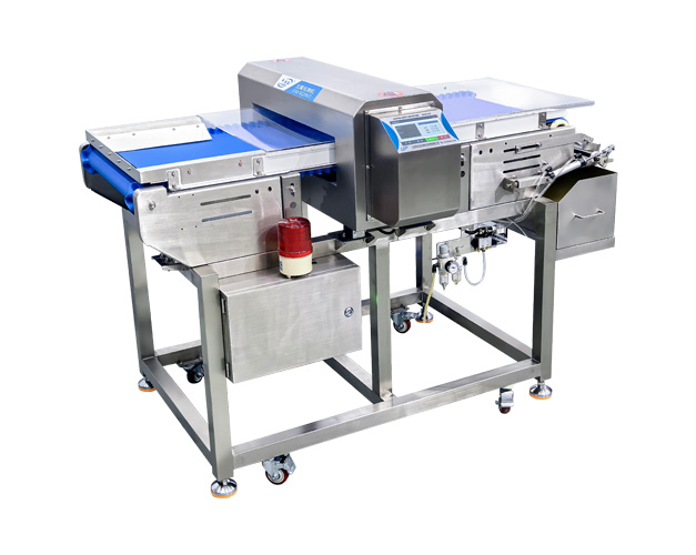 DLM-510-5508翻板剔除香熏料金检机 带收集箱 蓝色花纹皮带.jpg